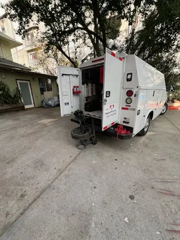 Magnet Plumbing service vehicle on-site for Grease Trap Cleaning in California Heights